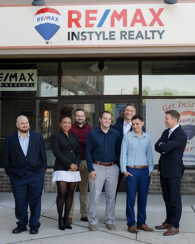 The Monaco Team outside the RE/MAX Instyle Realty office